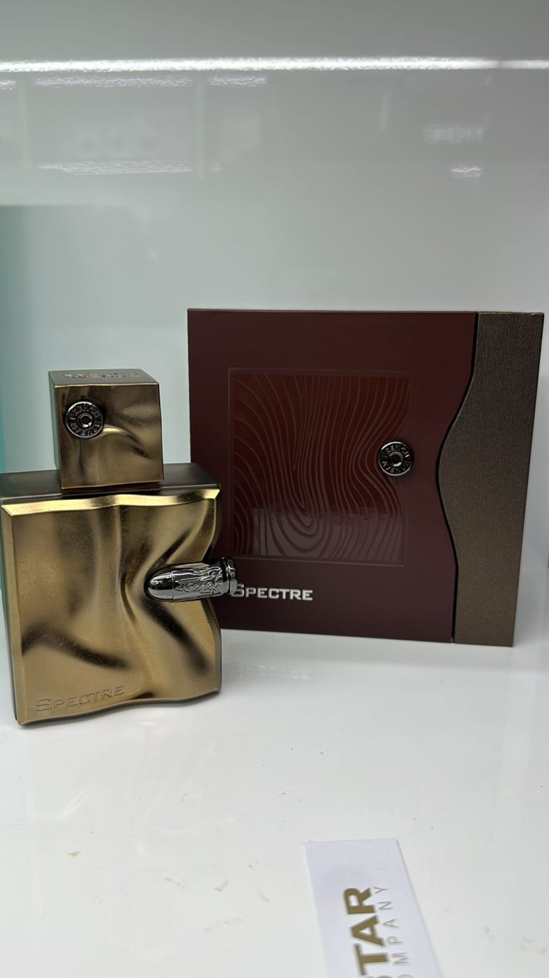 Perfume árabe Asad em frasco preto com detalhes dourados